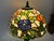 Vintage midcentury Tiffany style leaded stained glass table lamp. Shade is handmade with multicolor botanic floral...