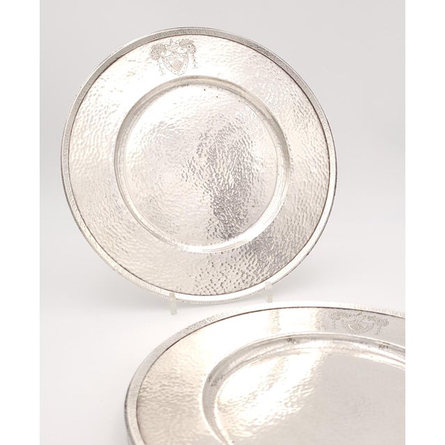 A set of four Rogers Brothers silver plates, monogram of M.K.G.