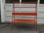 Painted Modernist Style single drawer etagere circa 1960. Steel frame and cross stretcher with removable perforated...