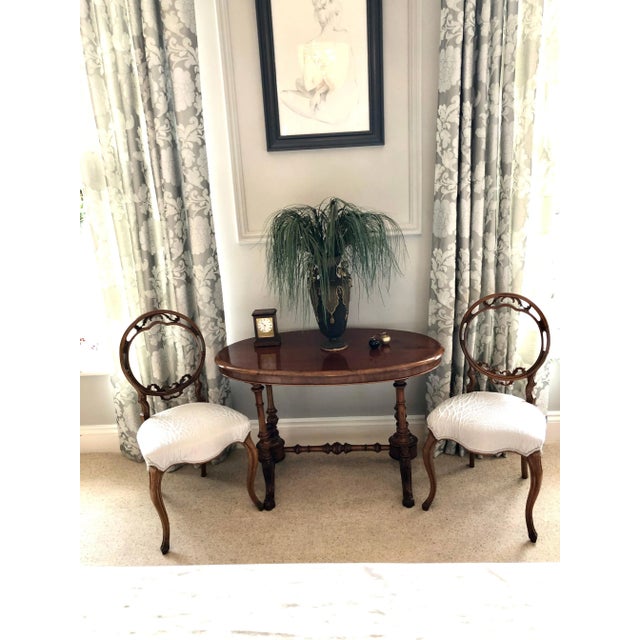 19th century victorian antique oval walnut centre table having a splendid oval solid walnut top and an oval walnut frieze...