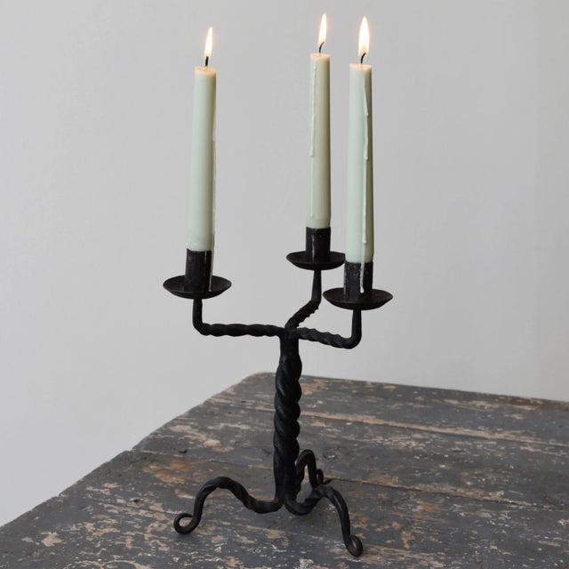 Vintage Wrought Iron Twisted Tripod Candelabra, Circa Early-Mid 20th Century. Hand-forged iron body with three candle...