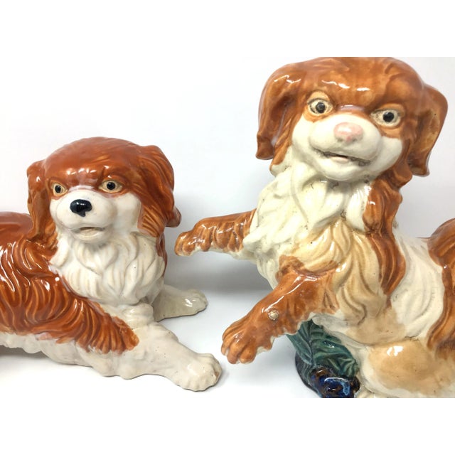 A set of two large, heavy and detailed ceramic hand-painted Staffordshire style majolica Cavalier King Spaniel ceramic dog...