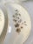 Pretty set of six antique English stoneware bone dishes in a multi-color delicate floral motif. Due to age of dishes,...