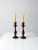 This is a pair of vintage wooden candlestick holders. The classic baluster shaped wood candle holders have a rich dark...