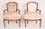 Pair of Louis XVI beech wood armchair frames, circa 1800. Seat cushions are 50% down and 50% feathers.