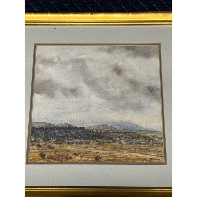 Original watercolor of a prairie style landscape. Signed D Taylor in the lower corner. Excellent condition. Matting to...
