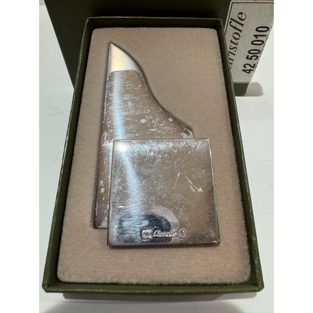 Christofle Cubik letter opener in silver-plated metal, featuring a sculptural geometric Modernist design. Christofle maker...