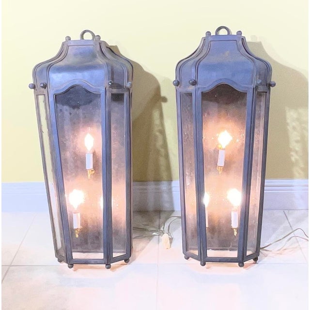 Enhance your home’s indoor or outdoor character with this exceptional, matching pair of vintage hand-forged solid...
