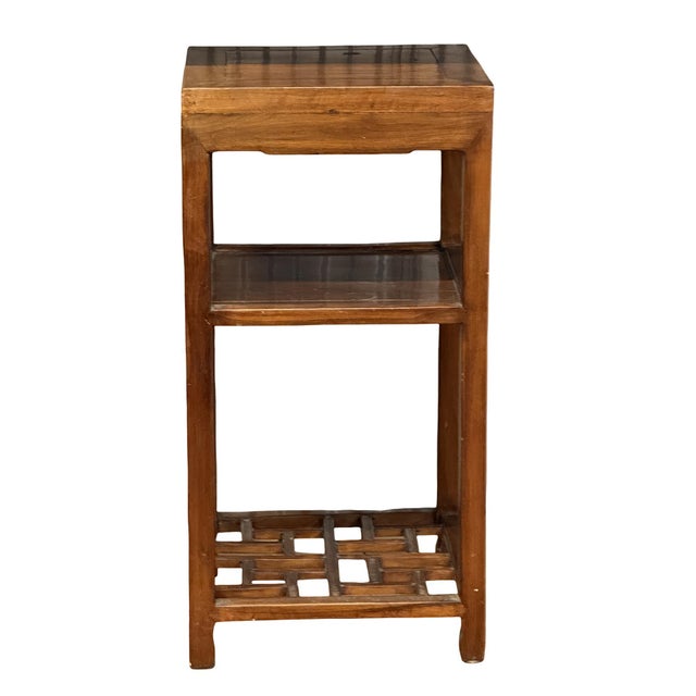 Add a touch of timeless Eastern elegance to your space with this mid-20th-century wooden multi-functional stand....