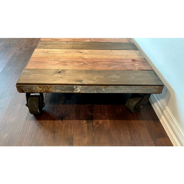 Inspired by vintage warehouse and factory trucks, this strong and sturdy industrial metal cart has been transformed into a...