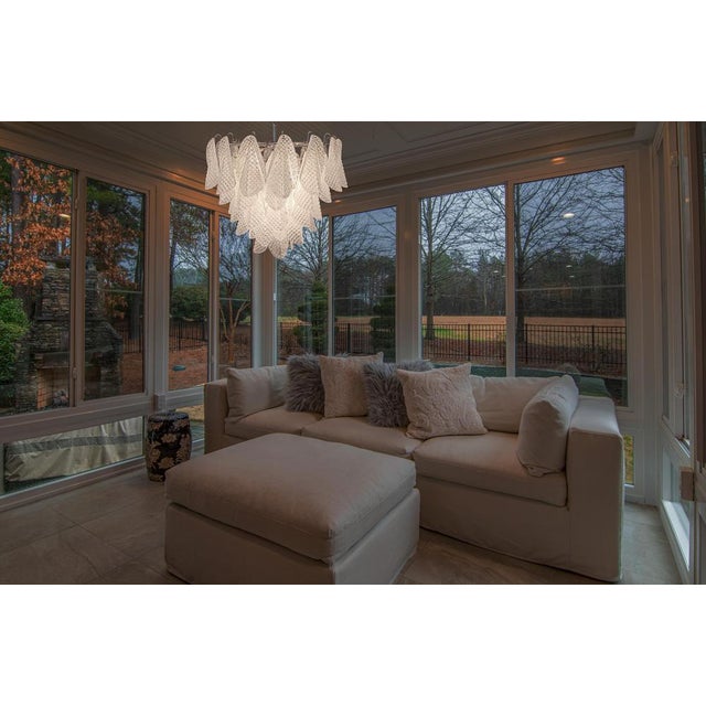 Italian vintage murano chandelier made by 57 glass petals "rondini" (transparent crystal, smooth outside, with crystal...