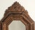 A Baroque style 19th-century Dutch copper repoussé mirror.