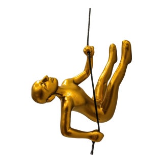 Gold Climbing Man Wall Art For Sale