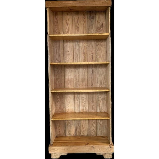 Old, hand-made wooden bookcase, made of solid pine wood with oak elements. Finished naturally, without excessive...