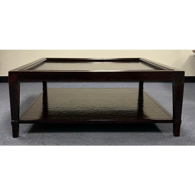 The Vintage Patina square cocktail table draws inspiration from the era of American design when all furnishings were...