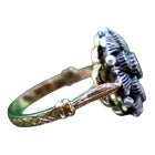 Gold and Silver Ring with Inlaid Zirconias and Flower-Shaped Reliefs For Sale