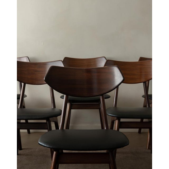 A striking set of six vintage dining chairs attributed to louis van teeffelen for awa, with the kind of sculptural clarity...