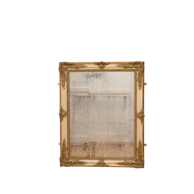 An elegant 19th-century French wall mirror, circa 1850, thoughtfully designed for versatile display in either portrait or...