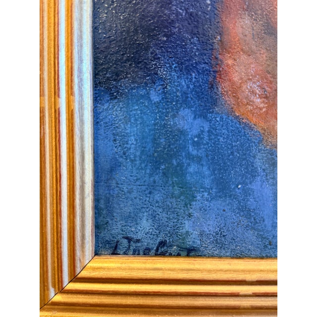 A quietly captivating Dutch oil on board portrait, depicting a young man in a coral-hued cap and blue shirt rendered in...