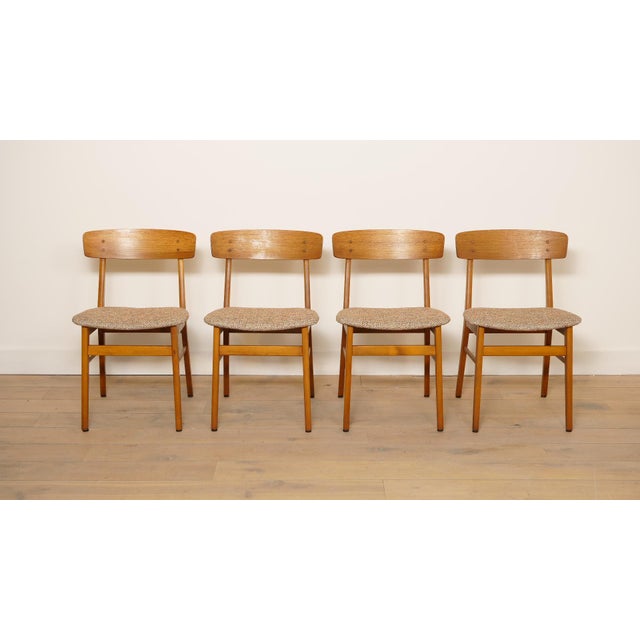 A beautiful set of 4 vintage dining chairs from the Farstrup brand. The chairs were designed in the 1960s. The frames are...