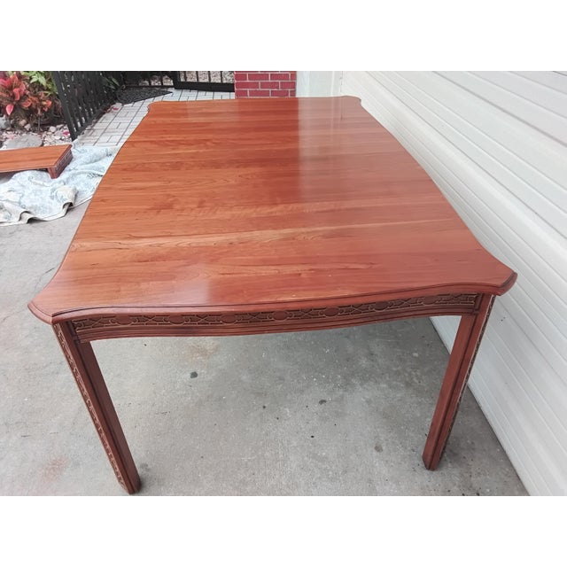 Solid natural cherry dining table, finish is adaptable with alot of other chair finishes.this is so versatile, can seat 4,...