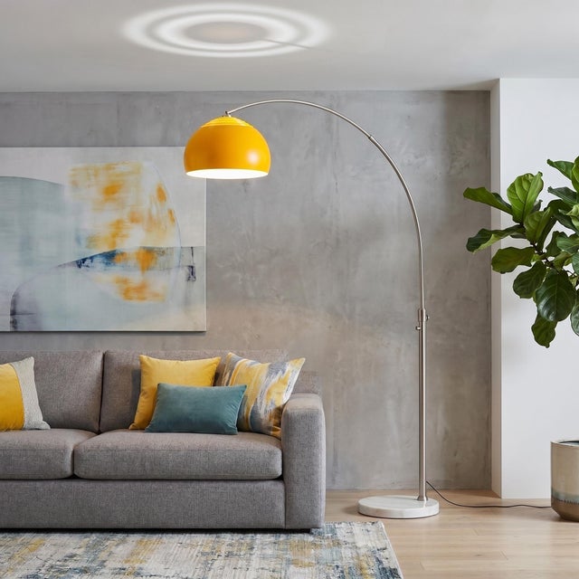 Searching for a sculptural arc floor lamp with a modern metallic finish? The Half Dome Arc Lamp arches 92" tall in...