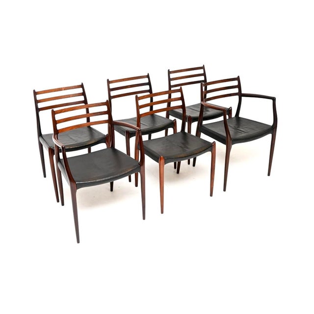 An exceptional set of six Danish model 78 and 62 dining chairs by Niels Moller. They were made in Denmark by JL Moller...