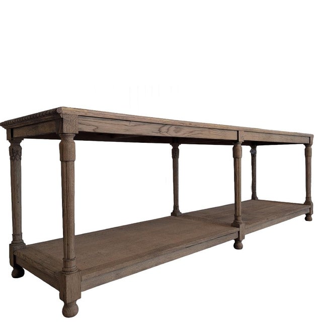 Imported from Belgium, this oak drapers table came from a shop in Liege. This table has an intricate braided detail on 3...