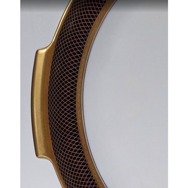 Love the "Helena" china in blue & gold grid from Rosenthal. Hard to find, most of the "Helena" china available is in...