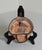 Hand-painted Portuguese pottery bowl by Ceramicarte Cascais featuring a whimsical fish motif in warm terracotta, cream,...
