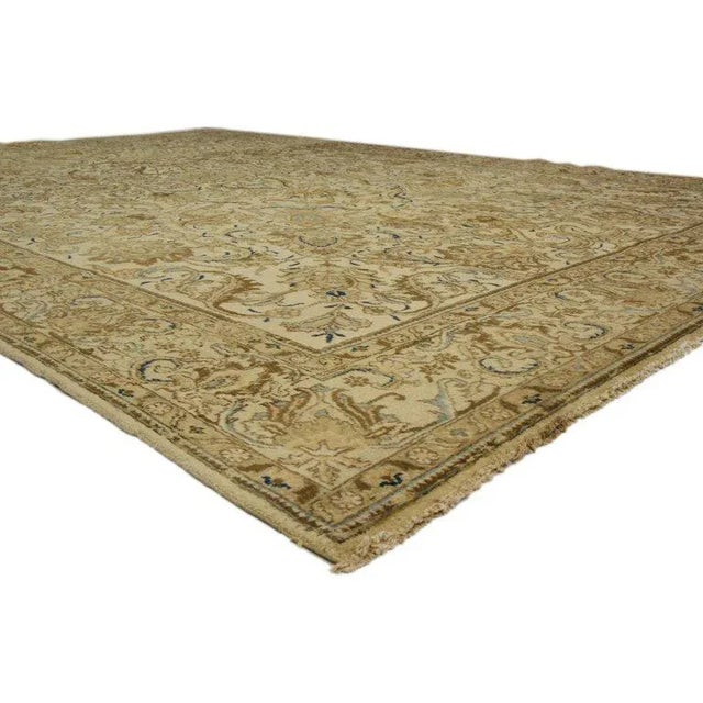 vintage Persian Tabriz rug with Victorian style and light colors. A juxtaposition of the modern and traditional, this hand...