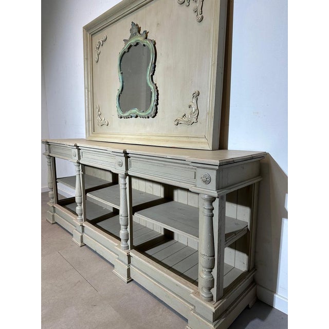 Enhance your interior with this beautiful patinated console table , finished in a timeless off-white hue . This piece...