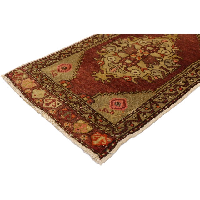 51482 Vintage Turkish Yastik Rug, 01'06 x 02'07. This hand-knotted wool vintage Turkish Yastik rug is a captivating...