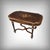 An elegant center table veneered in wood, enhanced by exquisitely fine marquetry featuring light wood stringing and a...