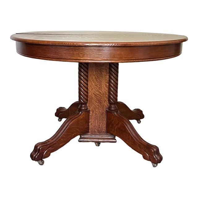 Antique 20th Century Tiger Oak Split Pedestal Table With Ornate Carvings & Paw Feet For Sale