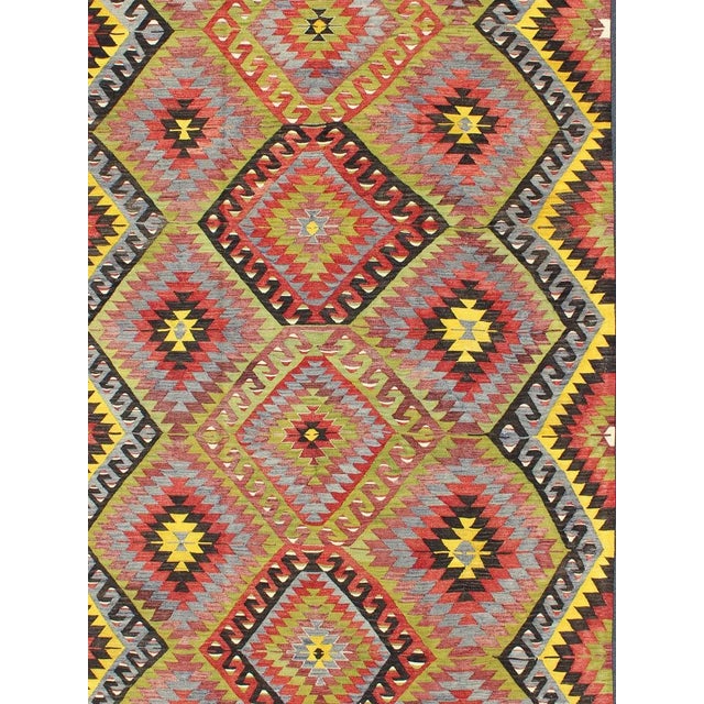 Keivan Woven Arts, Tu-Ned-114, kwarugs. This colorful Turkish Kilim boasts a repeating diamond pattern in vivid greens and...