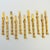 A set of 11 beautiful vintage cocktail forks. Made of metal, each piece has a lovely golden bamboo pattern to the handle...