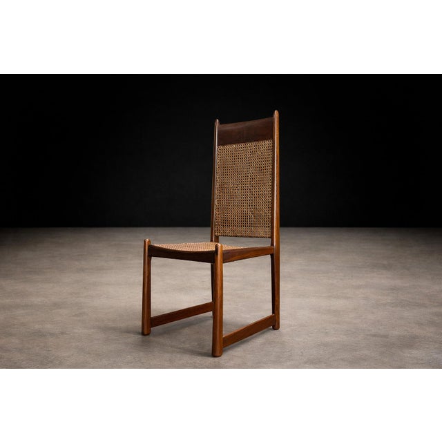 This exceptional set of twelve dining chairs, designed by Fatima in Brazil during the 1960s, stands as a commanding...
