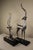 This large pair of Silver-Plated Deer with Tall Antlers and Glossy Black Bases would stun anyone coming into the room....