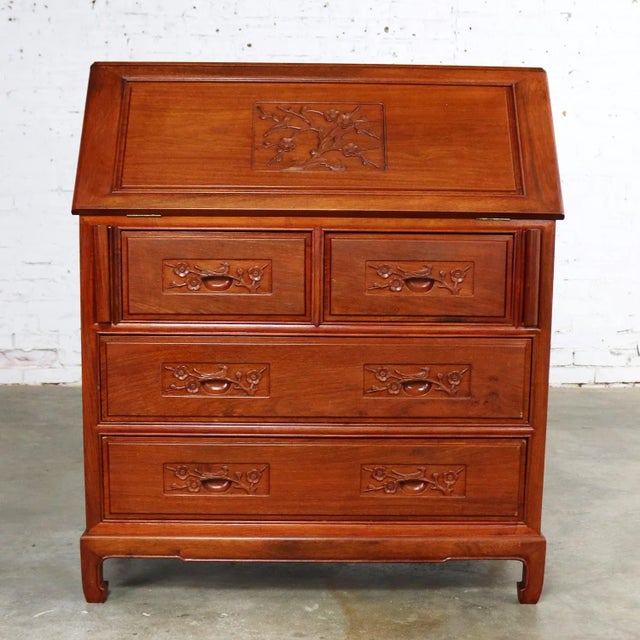 Handsome Asian teak hand carved drop slant front desk with interior compartmentalized cubby storage in the style of George...