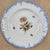 A charming set of four hand-painted porcelain floral plates by KPM Berlin, Germany, circa 1850. Each plate features a...