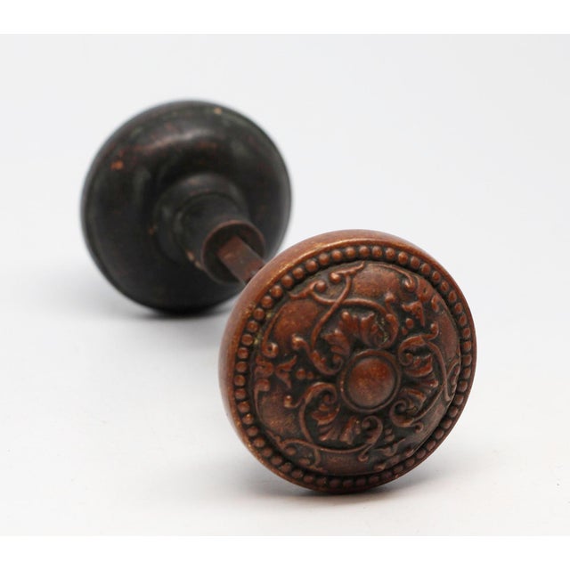 This 3 fold knobs was made by Sargent in the 1905 catalog. It is part of the G-12300 BF Design. One has a dark patina....