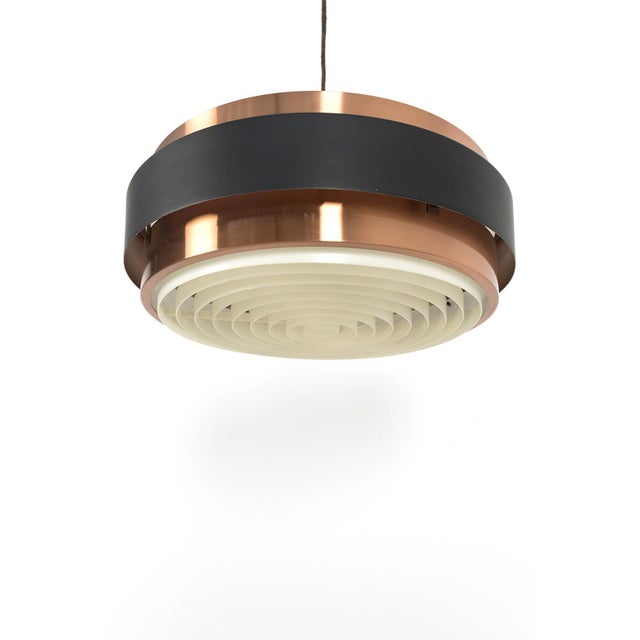 Beautiful Vintage Pendant Light in the Style of Hiemstra/Fog & Morup. The lamp has some traces of use consistent with its...