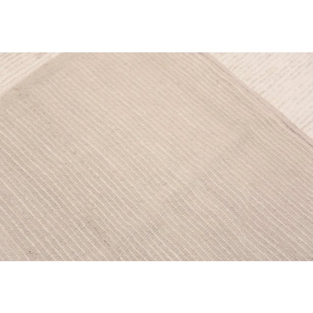 A Decorative Oversized Light Ivory Cream Background Minimalist Brown Tribal Geometric Design Modern Area Rug, Country of...