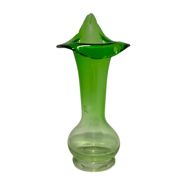 A hand-blown green Jack-in-the-Pulpit vase. Crafted in a luminous translucent emerald green, this vase features the iconic...