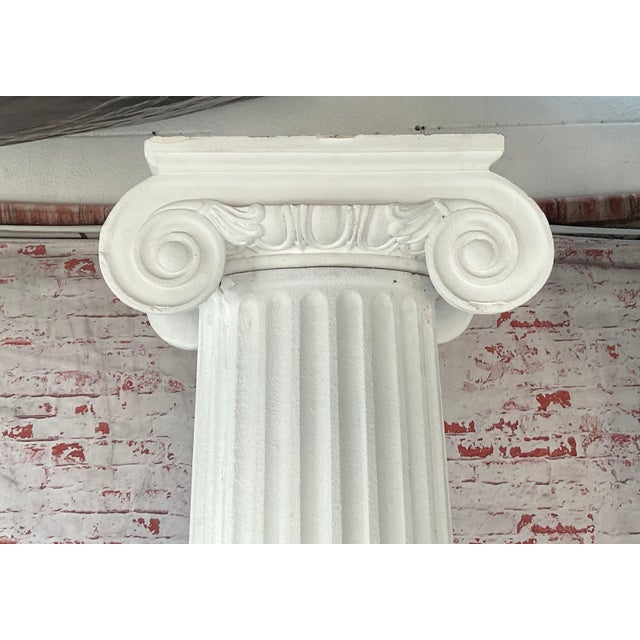 Decorative Early 20th Century Neoclassical Ionic Fluted Columns. Columns are modeled after the classical architecture of...