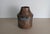 A handsome antique copper dairy vessel, likely dating to the late 19th century, with a cylindrical lower body, stepped and...