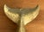 Handsome nautical solid brass whale tale fin door knocker with rustic appeal. Circa 1970s. Please see condition details...