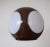 Colani ball lamp from the 70s in intense brown with milk glass-colored plastic inserts. This lamp is also `flying eye. She...