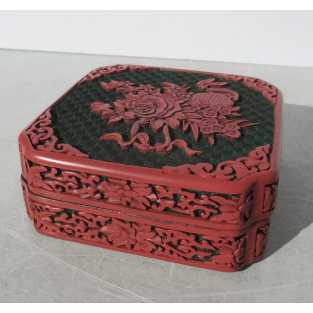 Beautiful red cinnabar carved Chinese Republic period box. Deeply carved to pass through thick red to a black core laver...